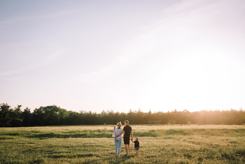 Family on vacant land